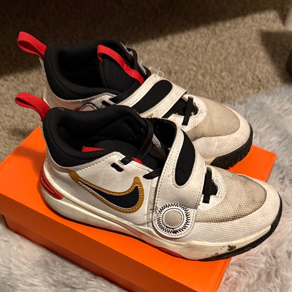 Nike Kids White, Black, and Gold Sneakers